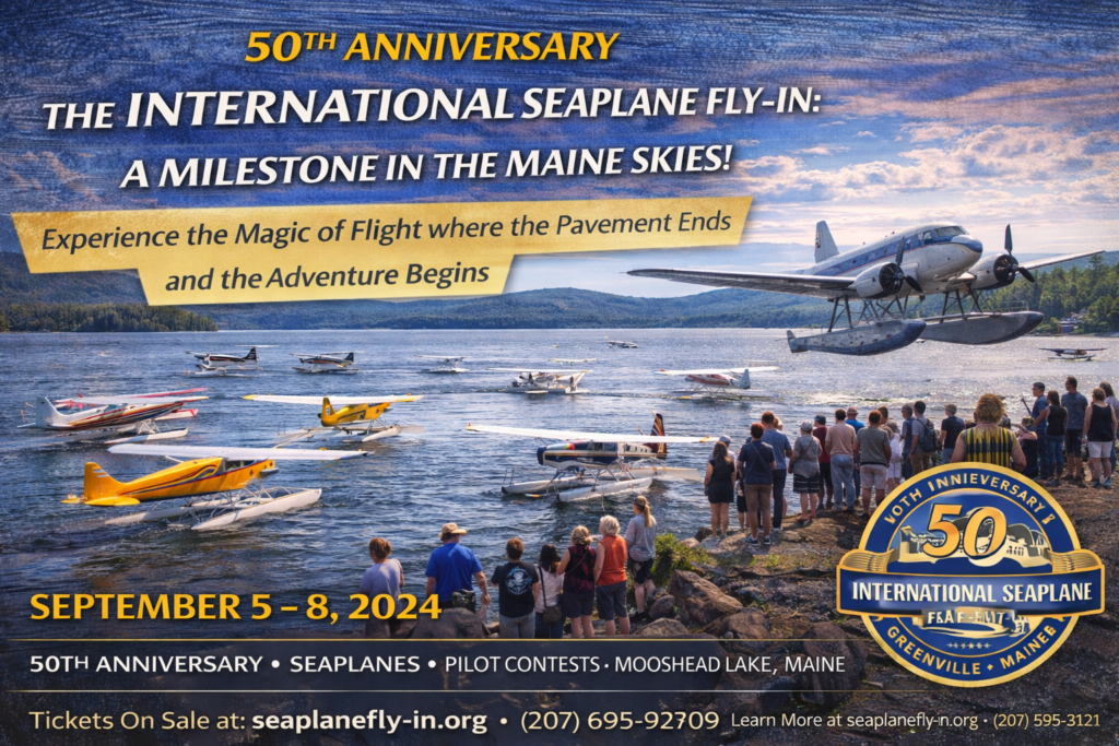 Seaplanes gathered on Moosehead Lake in Greenville Maine during the 50th Anniversary International Seaplane Fly-In with floatplanes, pilots, and spectators along the shoreline.